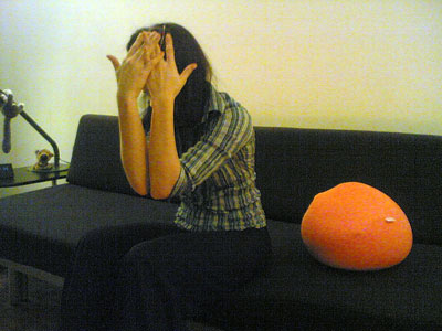Gano&eacute;e hiding her face